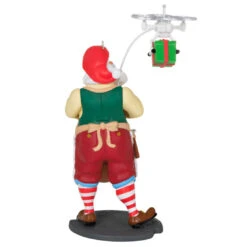 Hallmark Toymaker Santa Ornament 13 Hallmark Toymaker Santa Ornament -Ornament Shop Santa With Drone Keepsake Ornament 1999QXR8047 06
